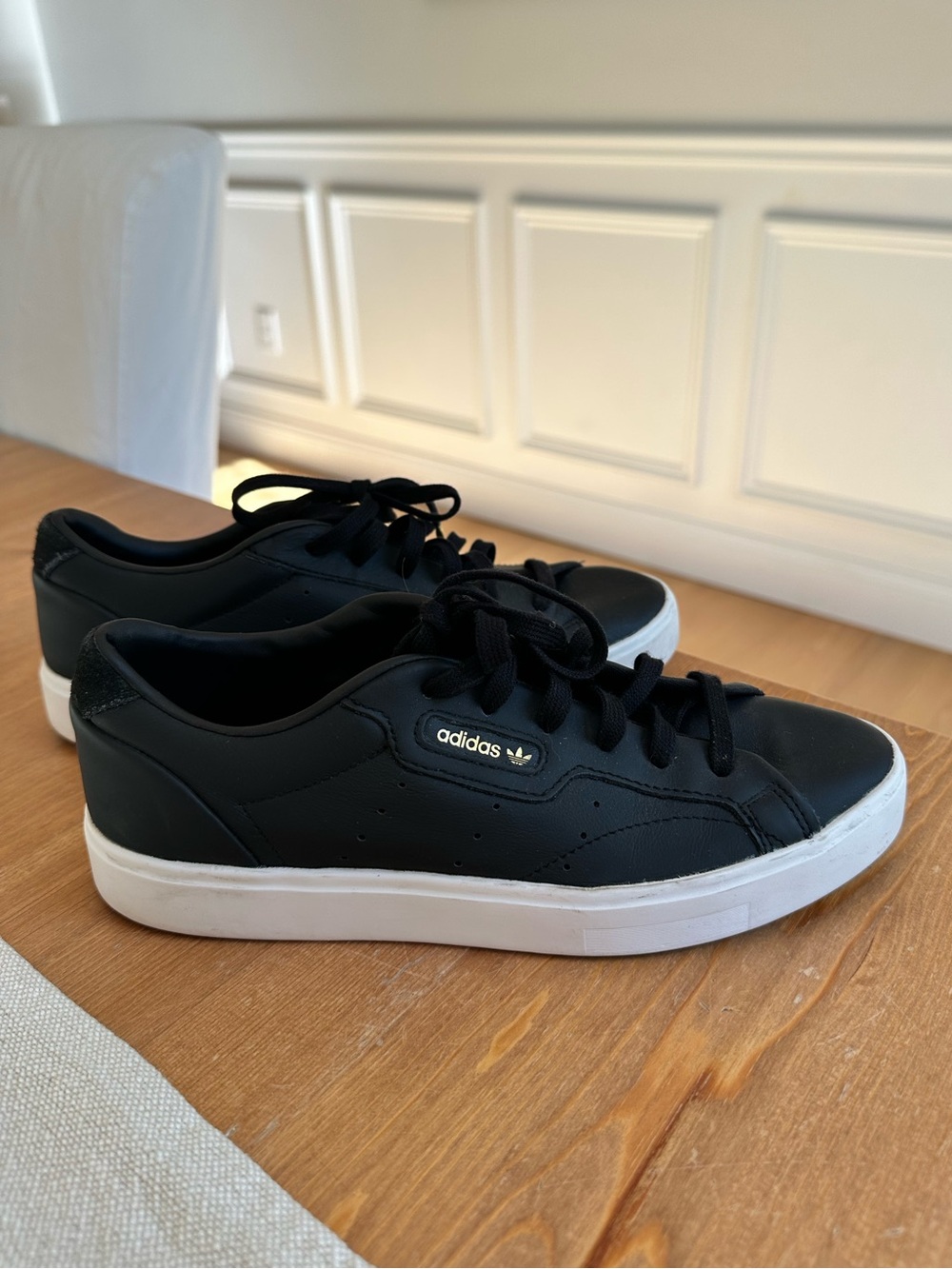 adidas Sleek Black Low-Top Sneakers with White Sole